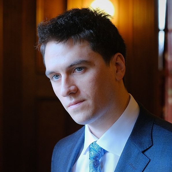 A headshot of Jeridan Kowal with short hair.